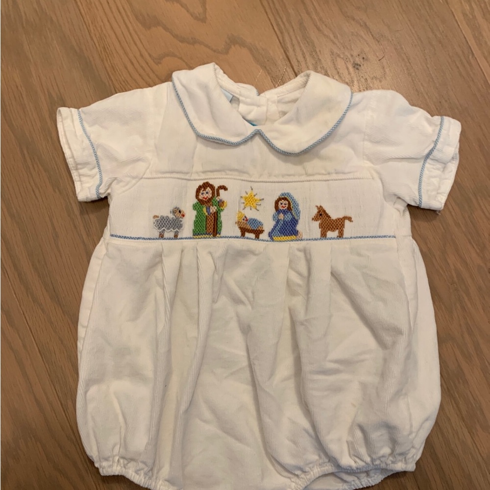 Claire and Charlie Manger Smocked Onesie
